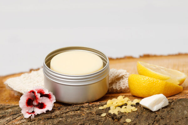 Sugarbush Lemon Lotion bar with slice of lemon